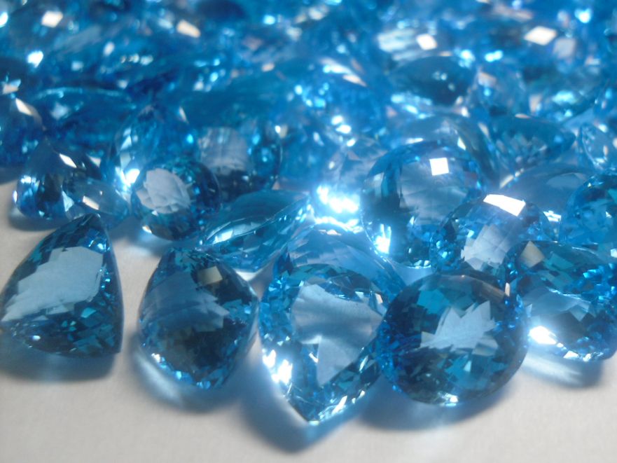 mixed faceted blue topaz